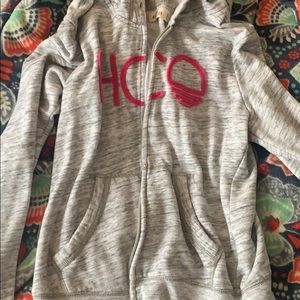 zip up jacket grey and pink on it
